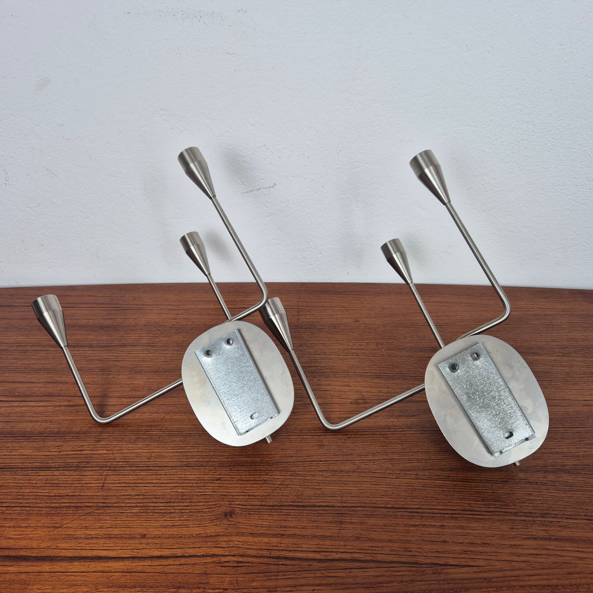 Świecznik ścienny Orion, stal nierdzewna srebrny, proj. P. Hein, Dania, XXI w. - 196966