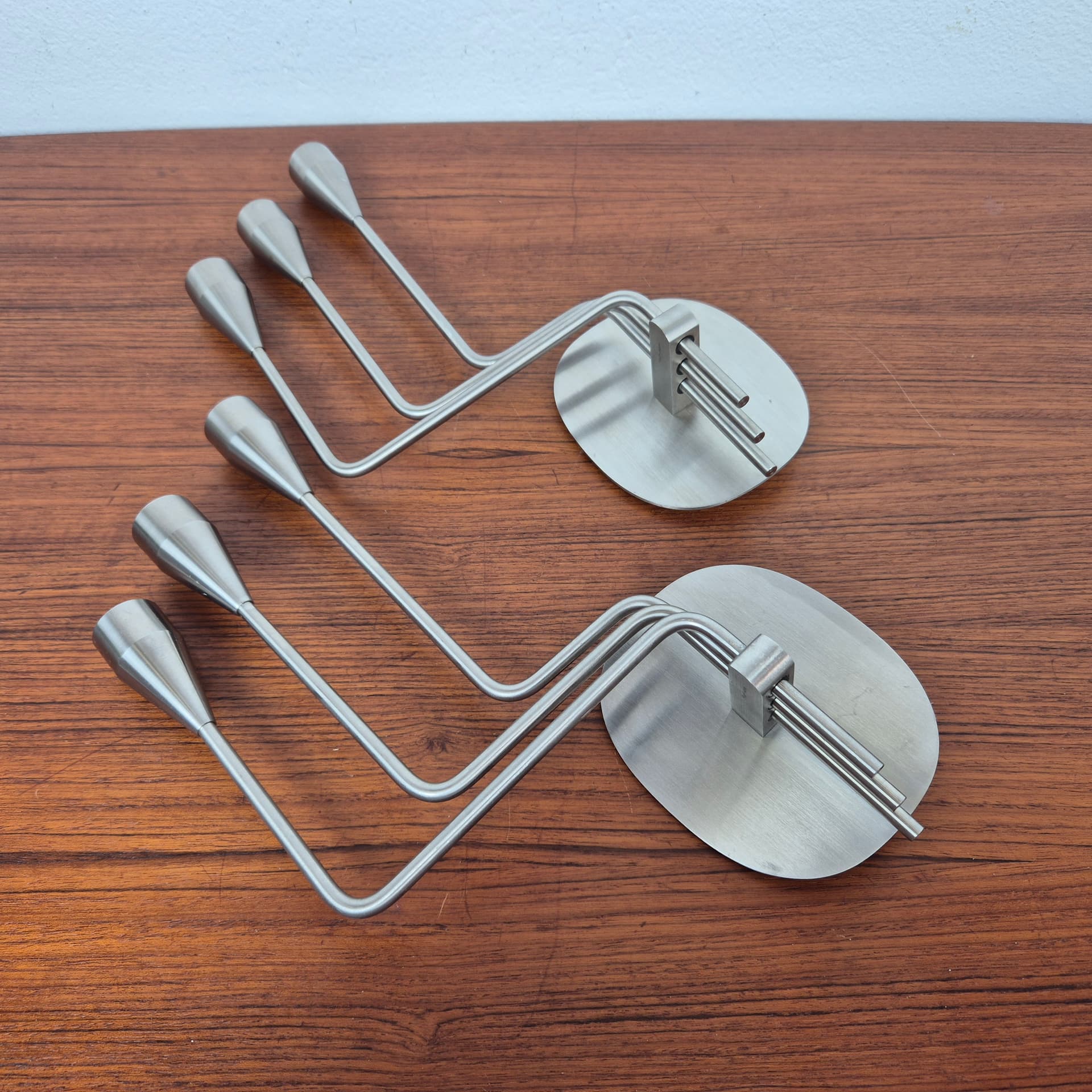 Świecznik ścienny Orion, stal nierdzewna srebrny, proj. P. Hein, Dania, XXI w. - 196967