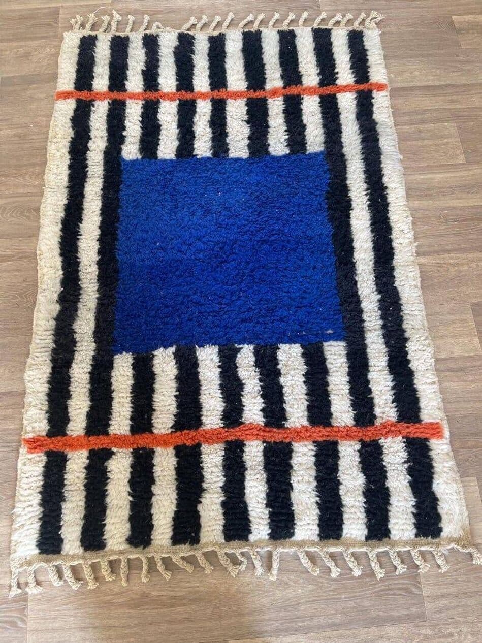Ręcznie tkany dywan 140x260 cm, wełna, niebieski, czarny, kość słoniowa, pomarańczowy, Maroko - 205322