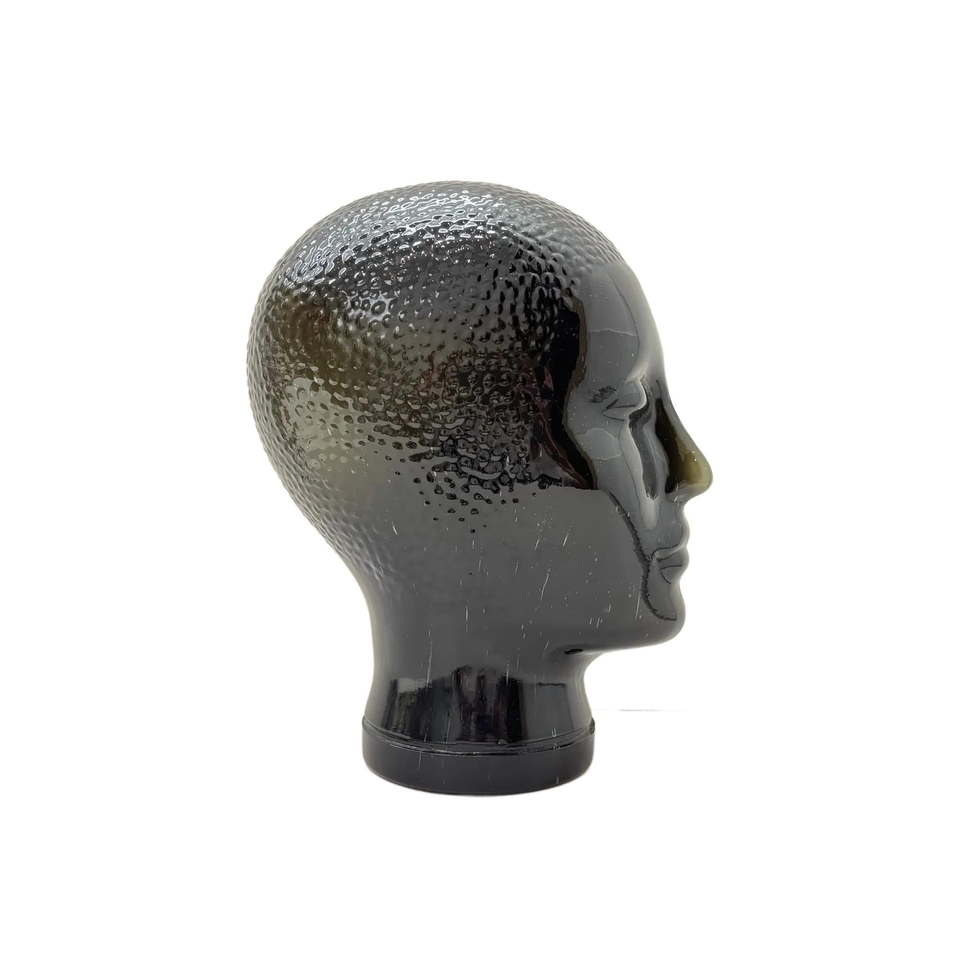 Decorative head, green glass, Germany, 1980s.