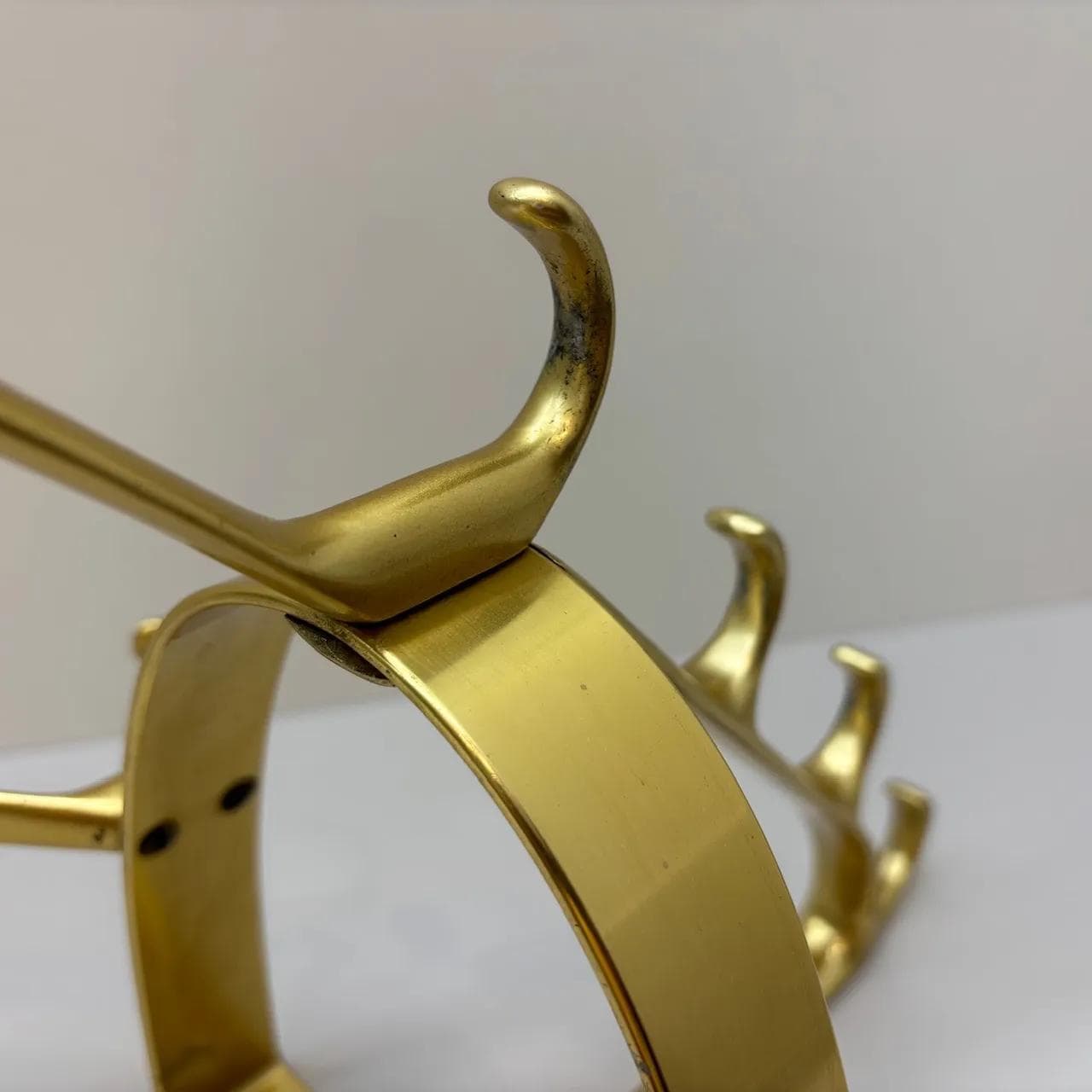 Wall-mounted coat rack, golden aluminum, Germany, 1970s. - 15578