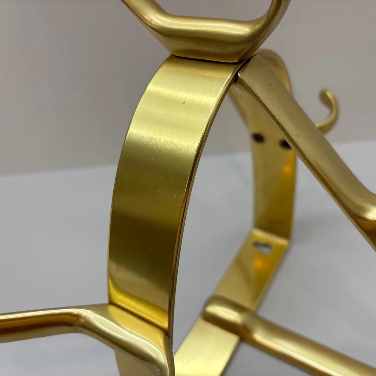 Wall-mounted coat rack, golden aluminum, Germany, 1970s. - 15579