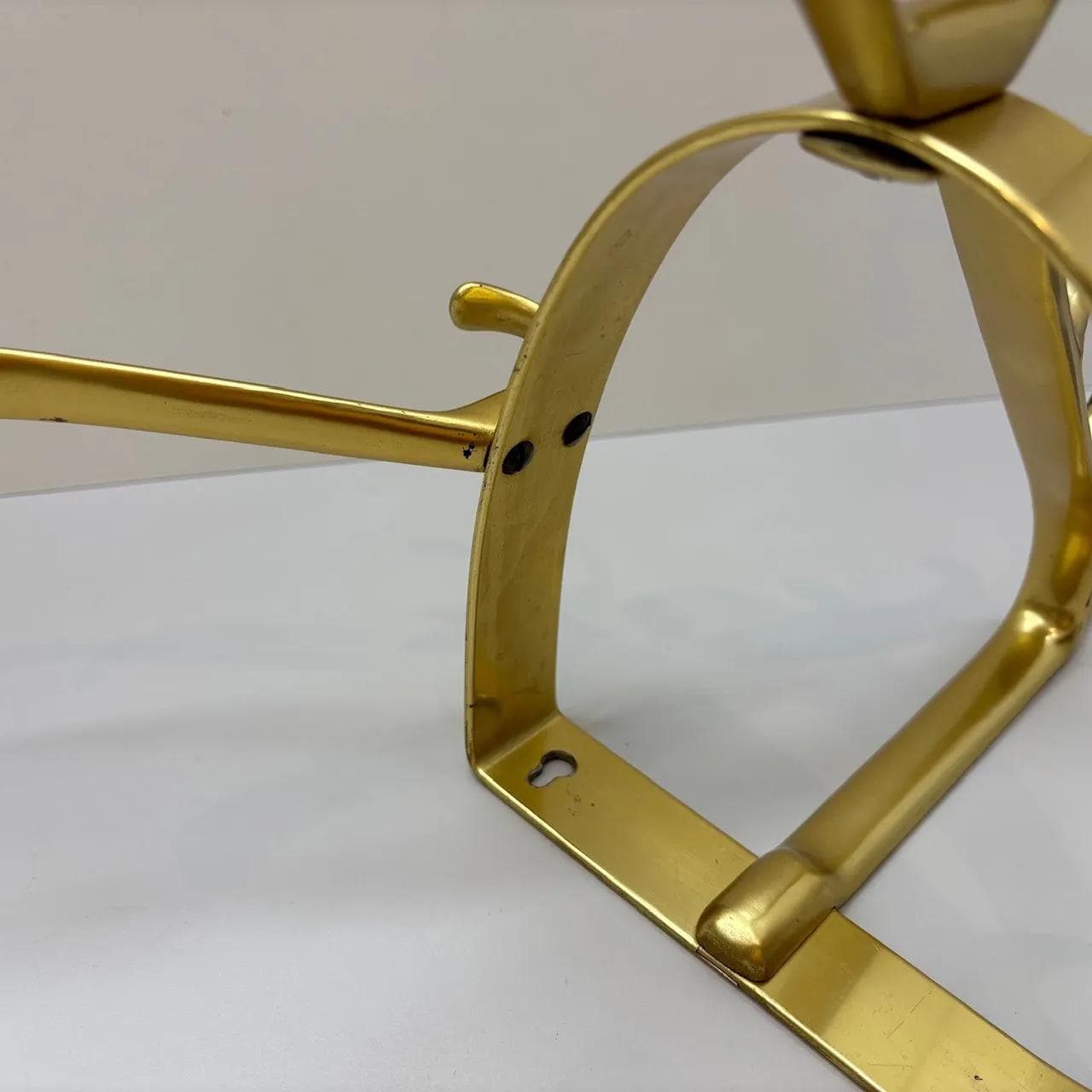 Wall-mounted coat rack, golden aluminum, Germany, 1970s. - 15577