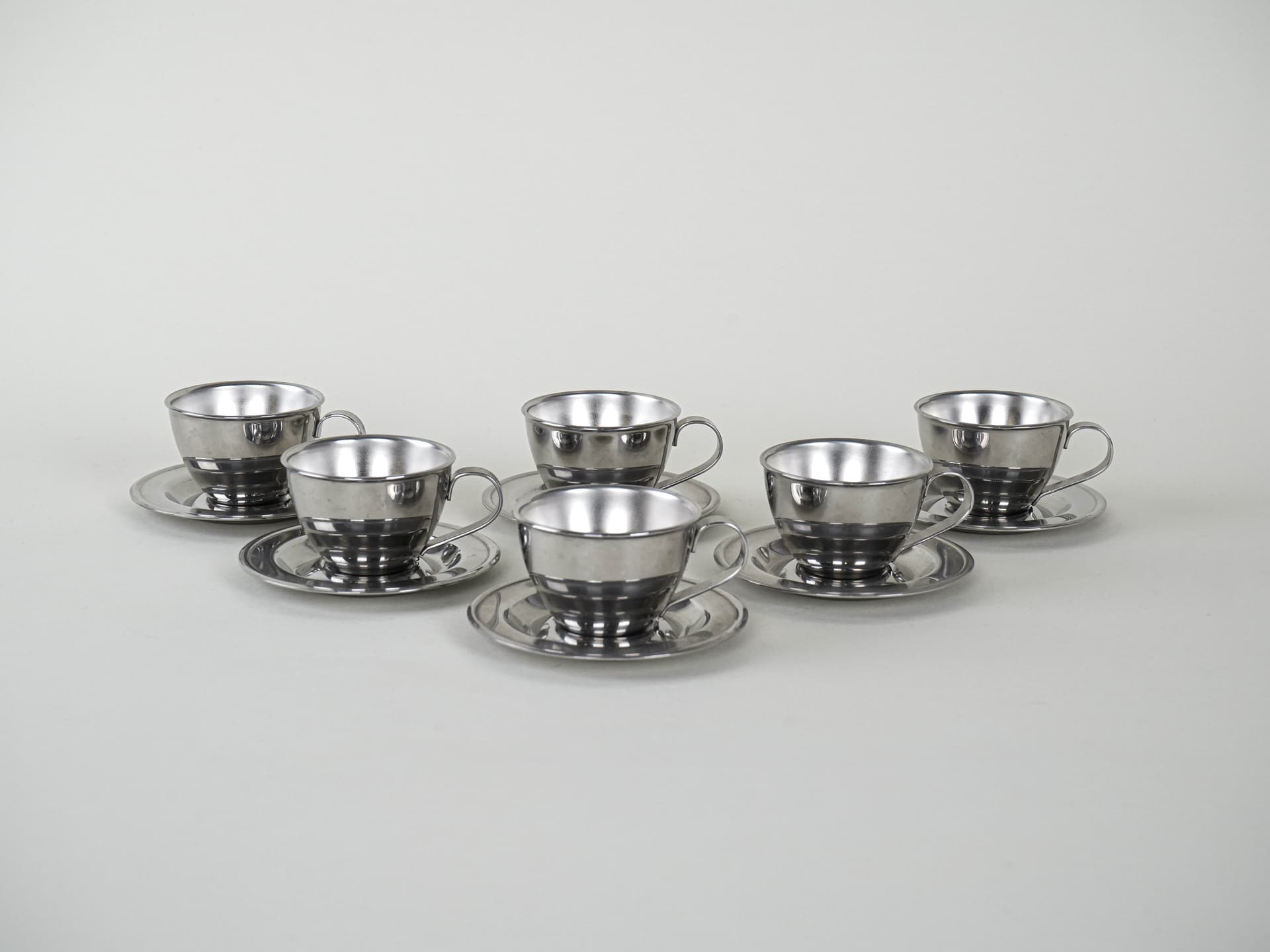 Set of cups, silver, stainless steel, Italy, 1980s. - 222783