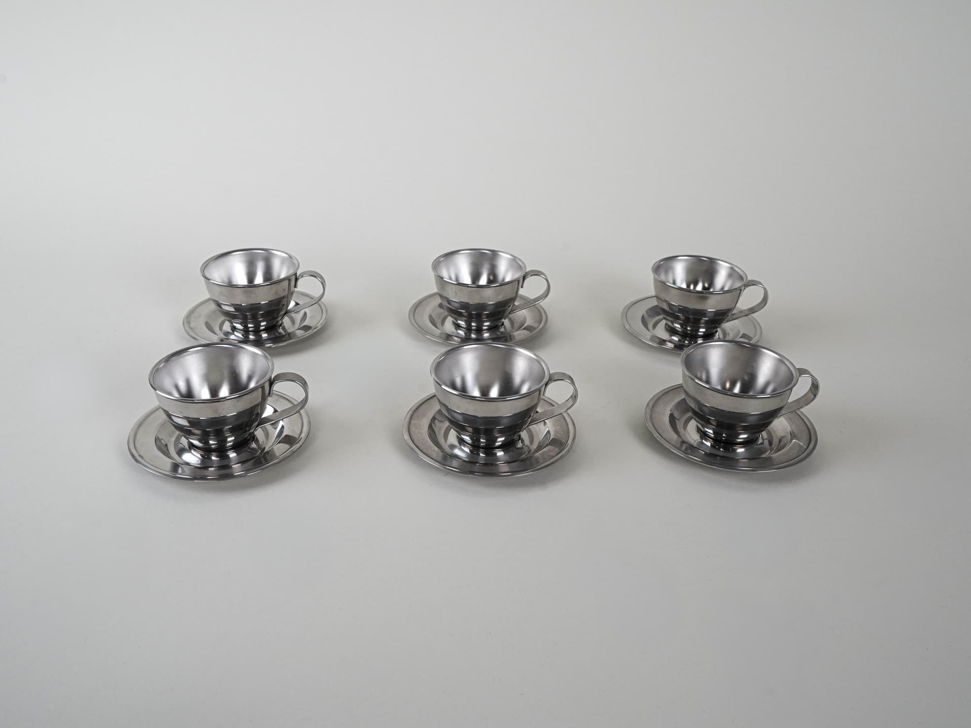 Set of cups, silver, stainless steel, Italy, 1980s. - 222784