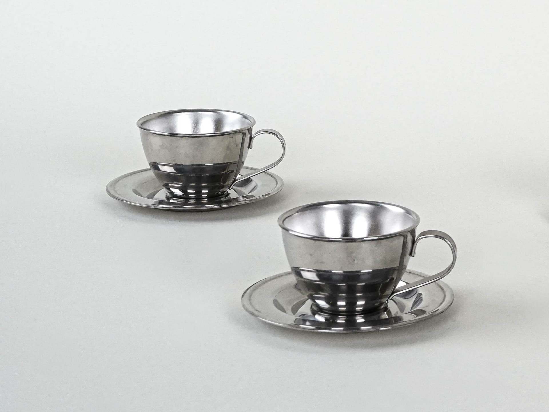 Set of cups, silver, stainless steel, Italy, 1980s. - 222781