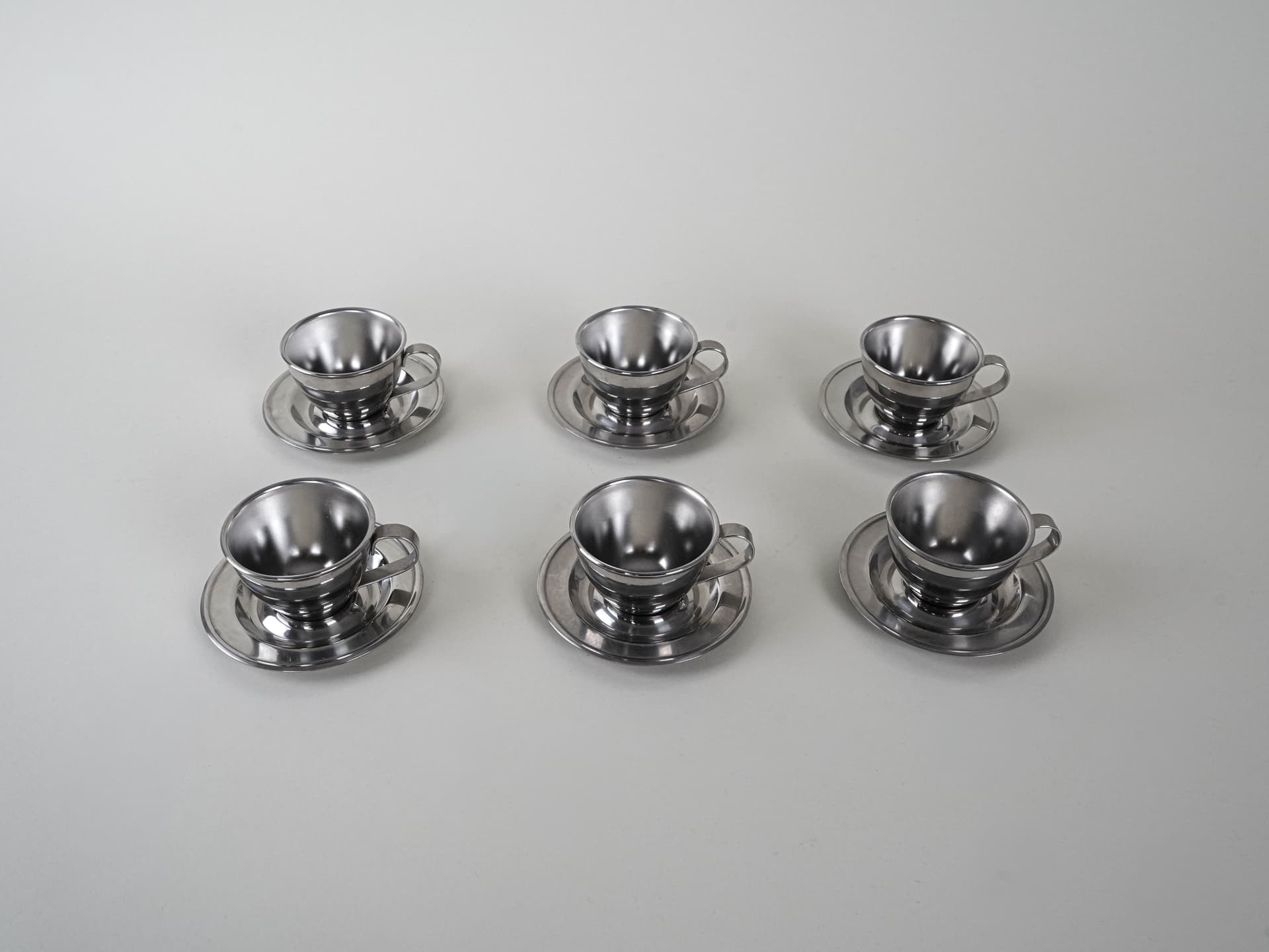 Set of cups, silver, stainless steel, Italy, 1980s. - 222785