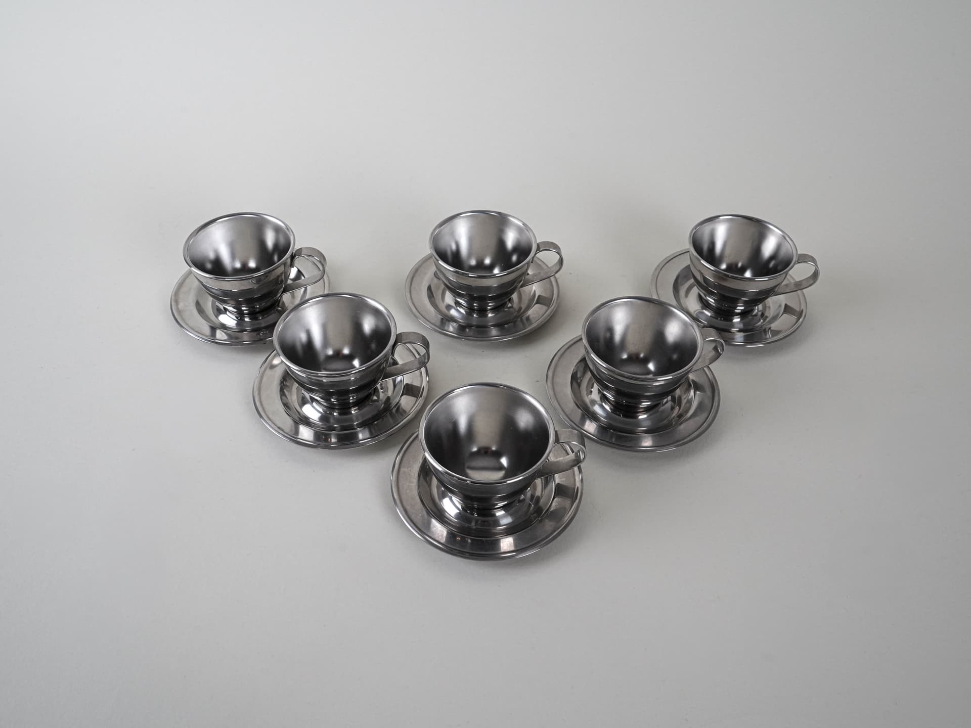 Set of cups, silver, stainless steel, Italy, 1980s. - 222786