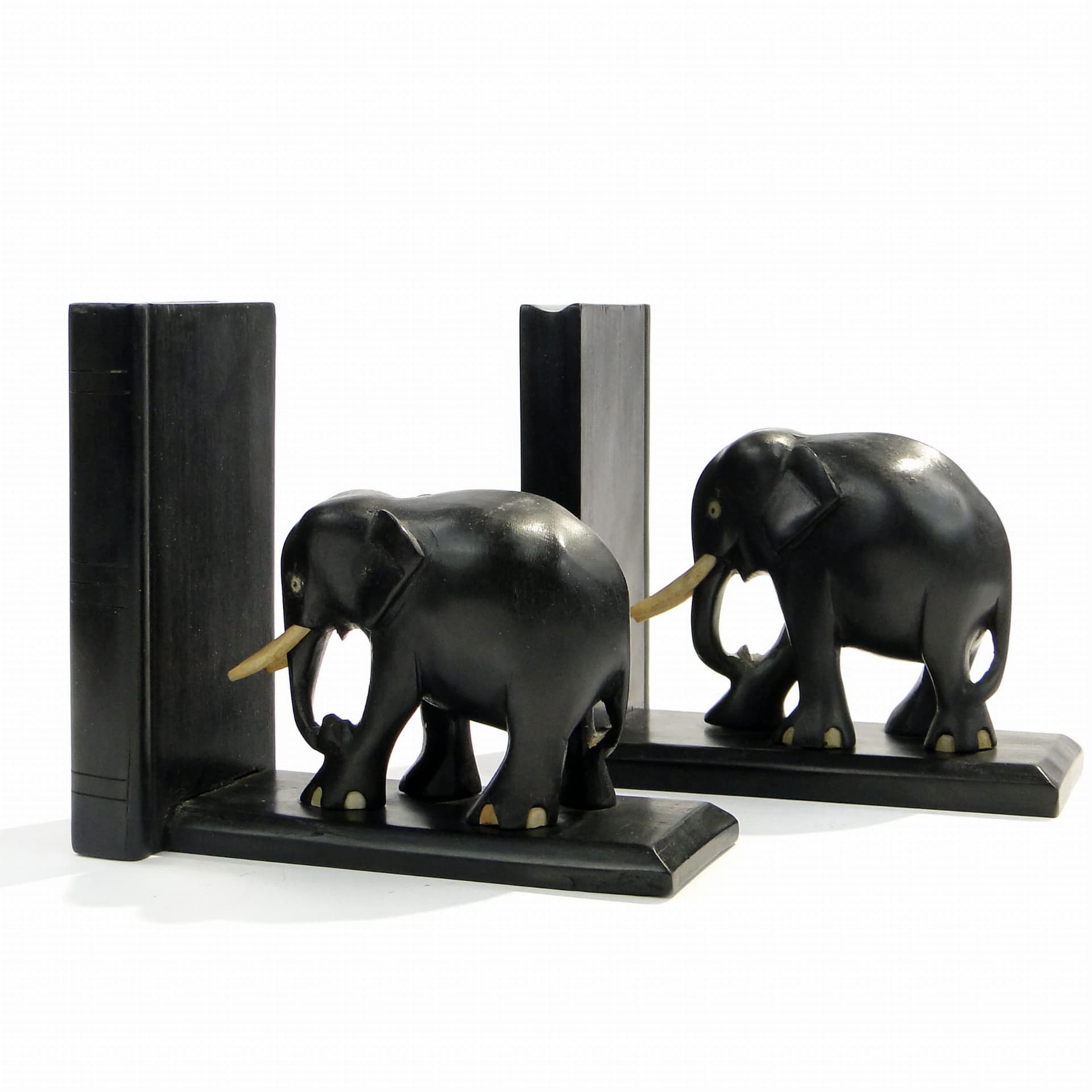Pair of bookends, elephant motif, black rosewood, Sri Lanka, 1950s. - 223592