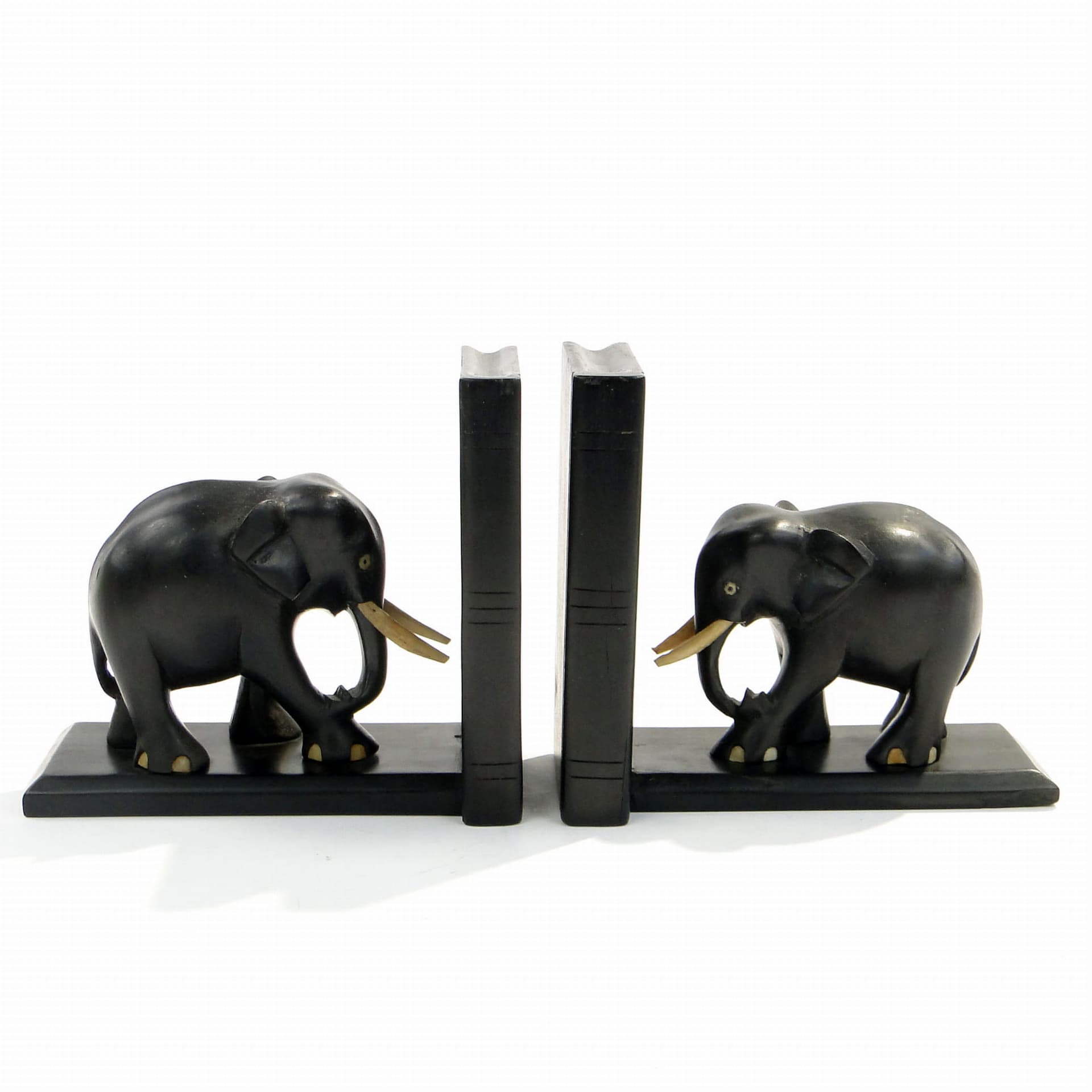 Pair of bookends, elephant motif, black rosewood, Sri Lanka, 1950s.