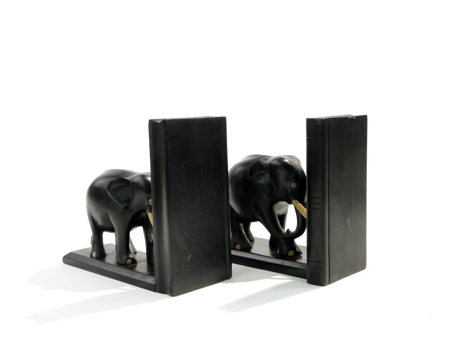 Pair of bookends, elephant motif, black rosewood, Sri Lanka, 1950s. - 223600