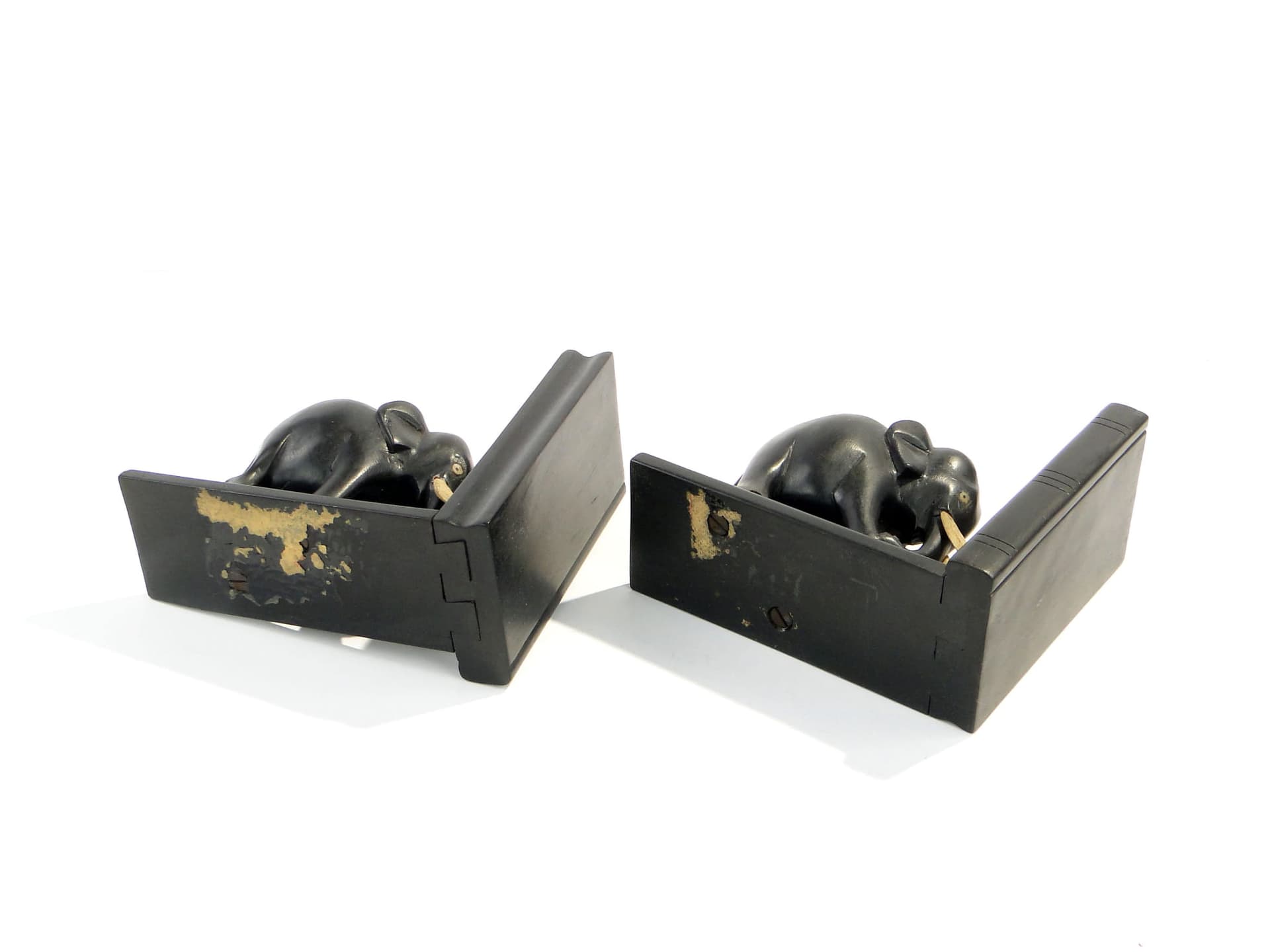 Pair of bookends, elephant motif, black rosewood, Sri Lanka, 1950s. - 223601