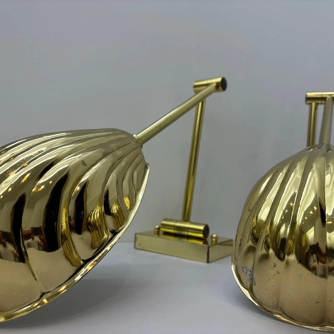 Pair of wall sconces Hollywood Regency, golden, steel brass, USA, 1970s. - 16577
