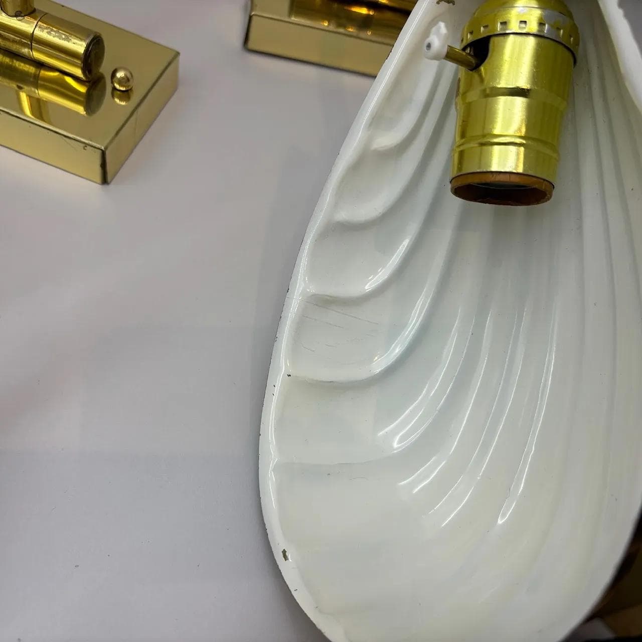 Pair of wall sconces Hollywood Regency, golden, steel brass, USA, 1970s. - 16579