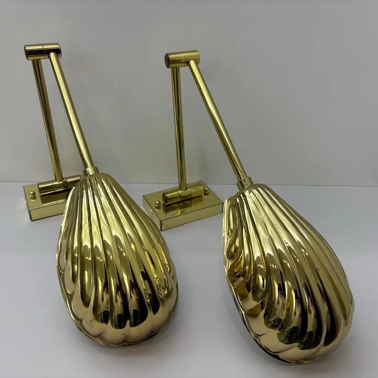 Pair of wall sconces Hollywood Regency, golden, steel brass, USA, 1970s. - 16584