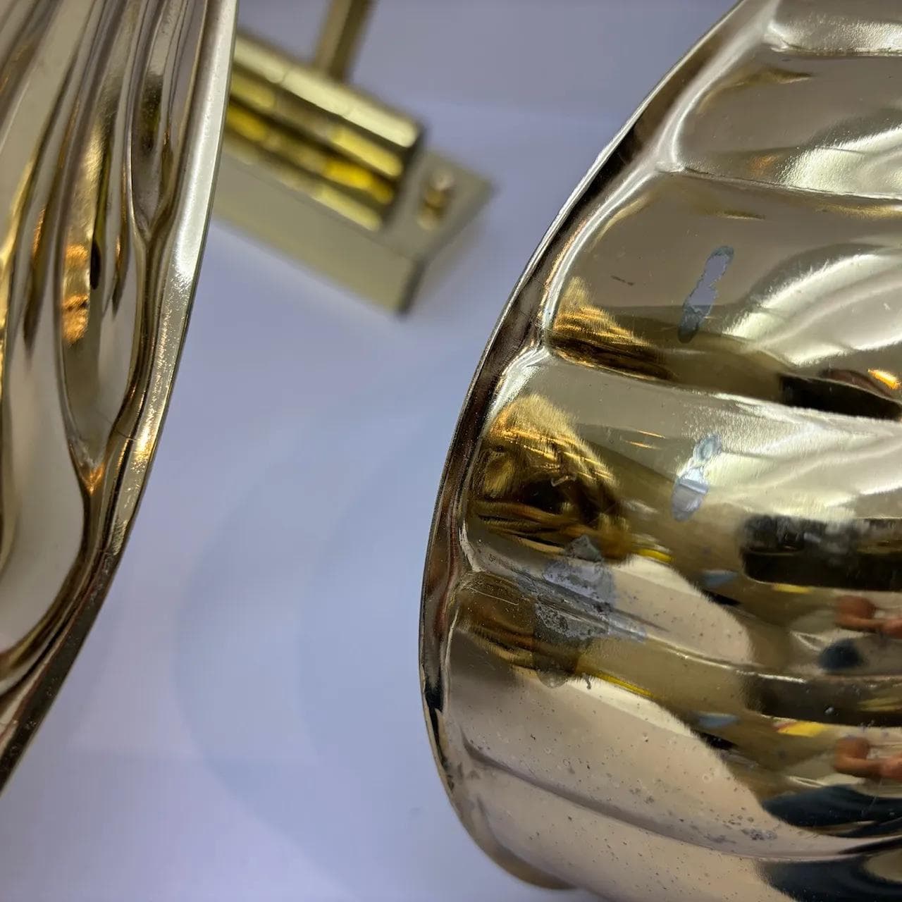 Pair of wall sconces Hollywood Regency, golden, steel brass, USA, 1970s. - 16580