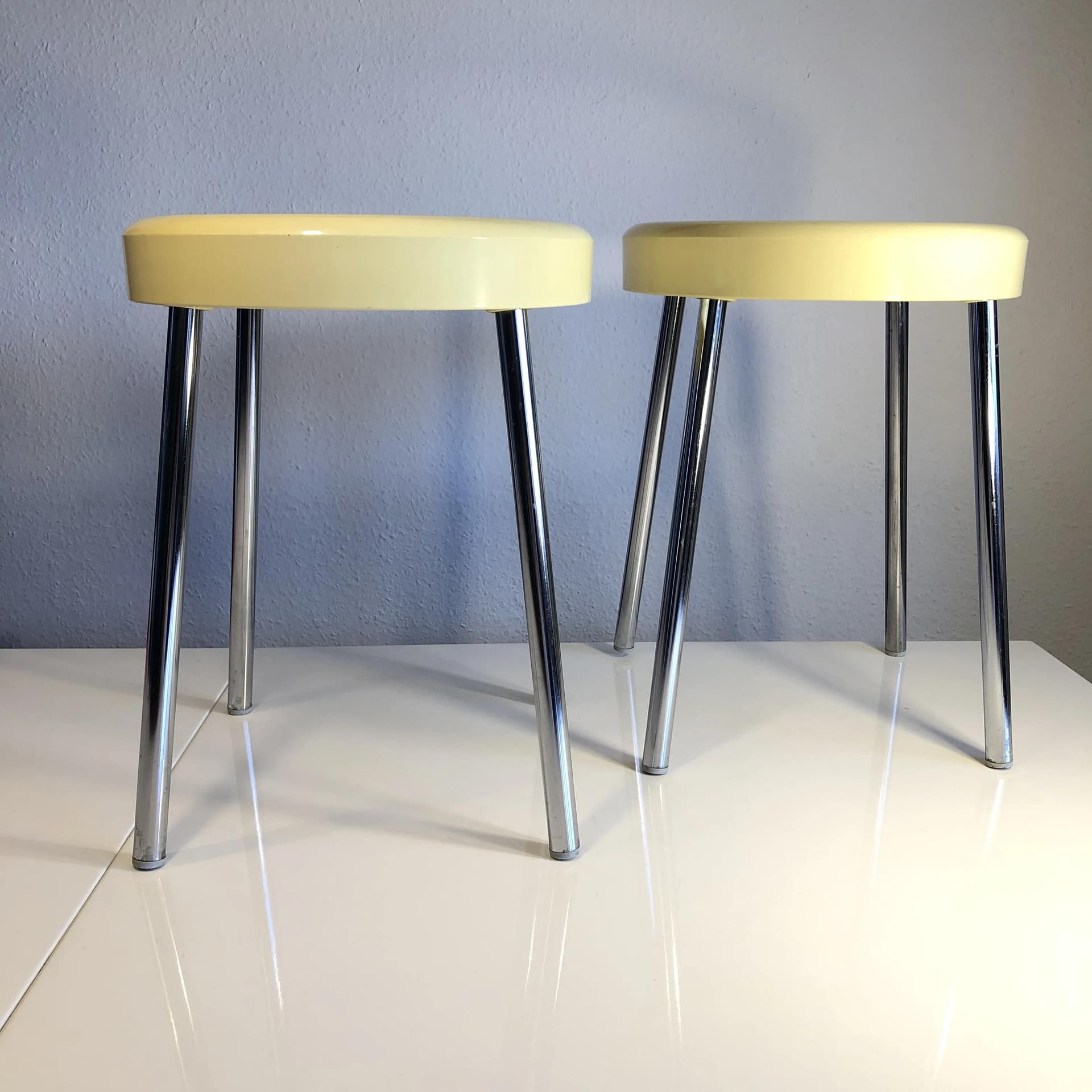 Pair of stools, ivory, plastic, chromed steel, Italy, 1970s. - 17667