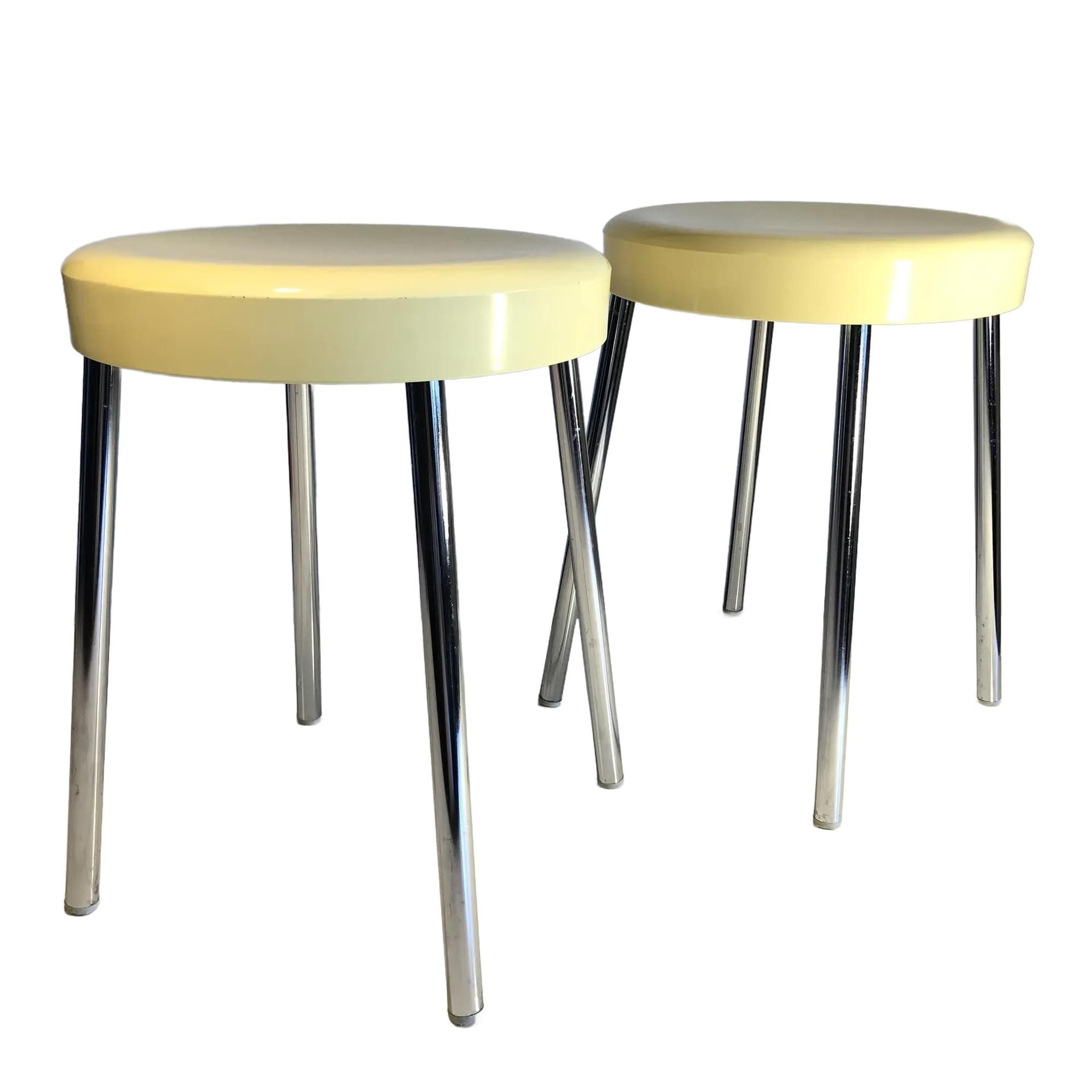 Pair of stools, ivory, plastic, chromed steel, Italy, 1970s.