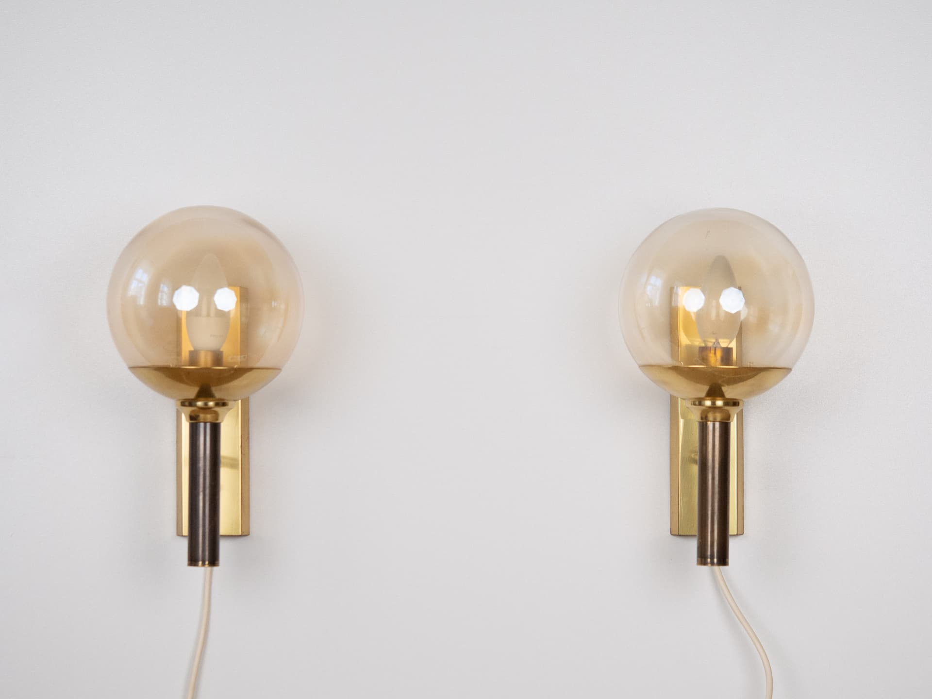 Pair of wall sconces, gold brass, transparent glass, by J. Hammerborg, Fog & Mørup, Sweden, 1960s. - 258230