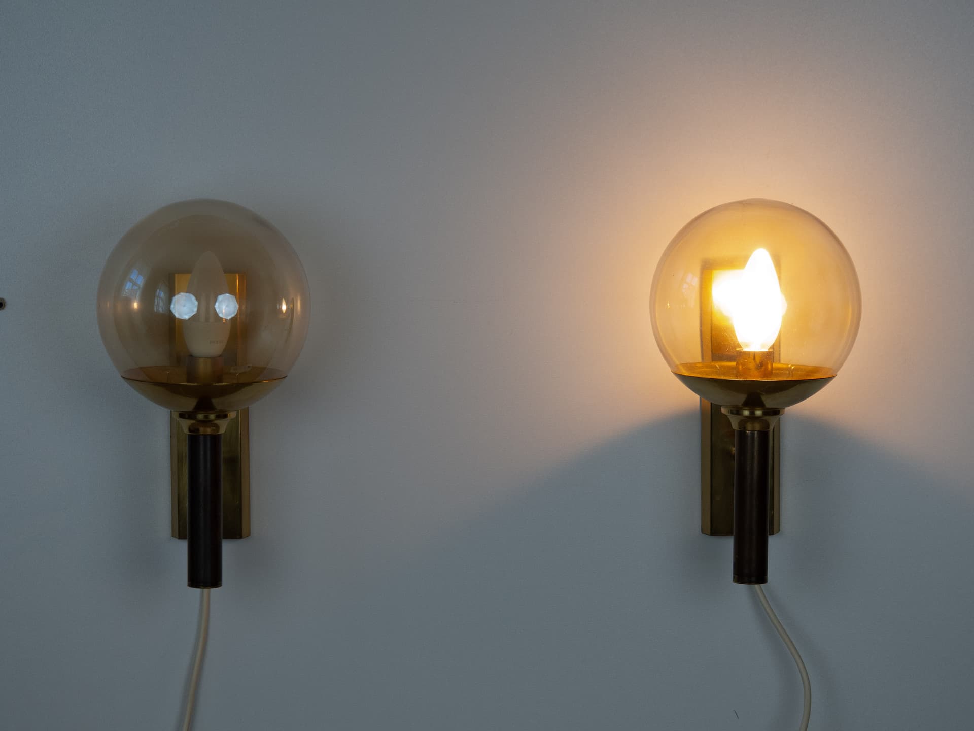 Pair of wall sconces, gold brass, transparent glass, by J. Hammerborg, Fog & Mørup, Sweden, 1960s. - 258235
