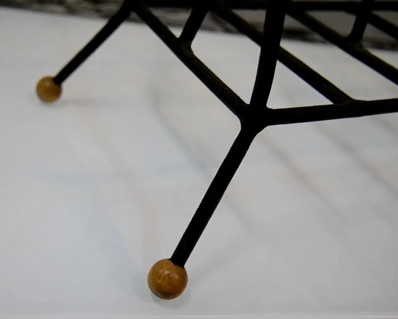 Magazine rack, black metal, by T. Paul, USA, 1950s. - 18823