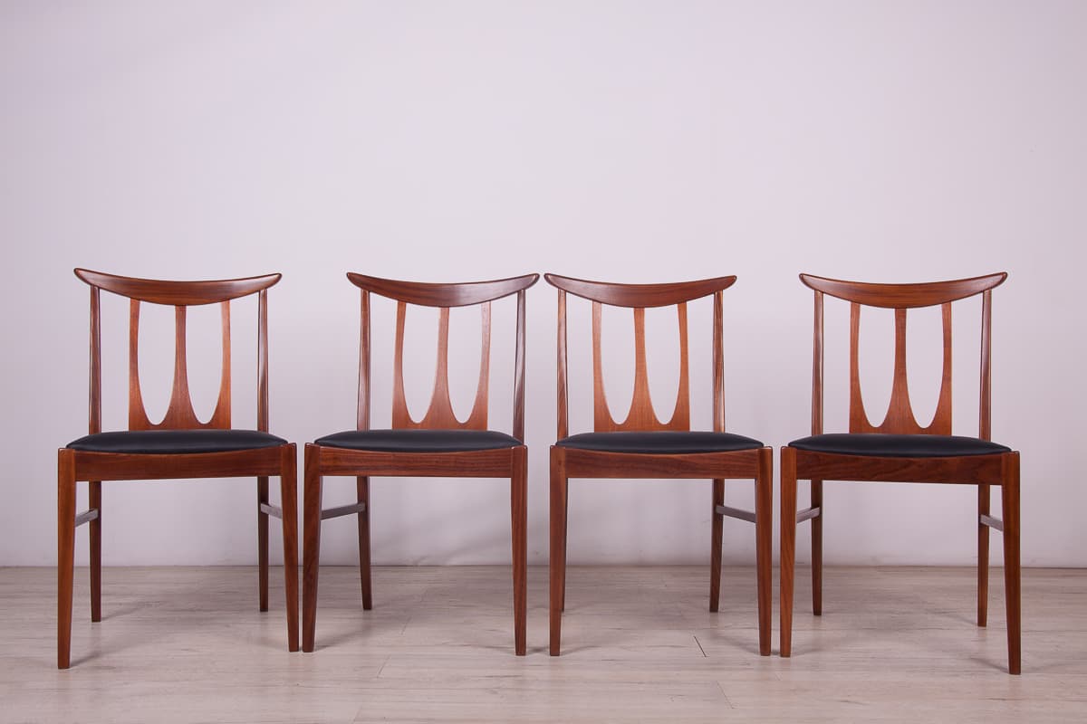 Set of four chairs Brasilia, brown teak, black leather, G-Plan, United Kingdom, 1950s. - 261512