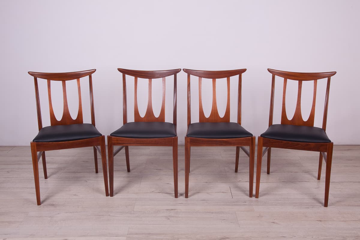 Set of four chairs Brasilia, brown teak, black leather, G-Plan, United Kingdom, 1950s. - 261511