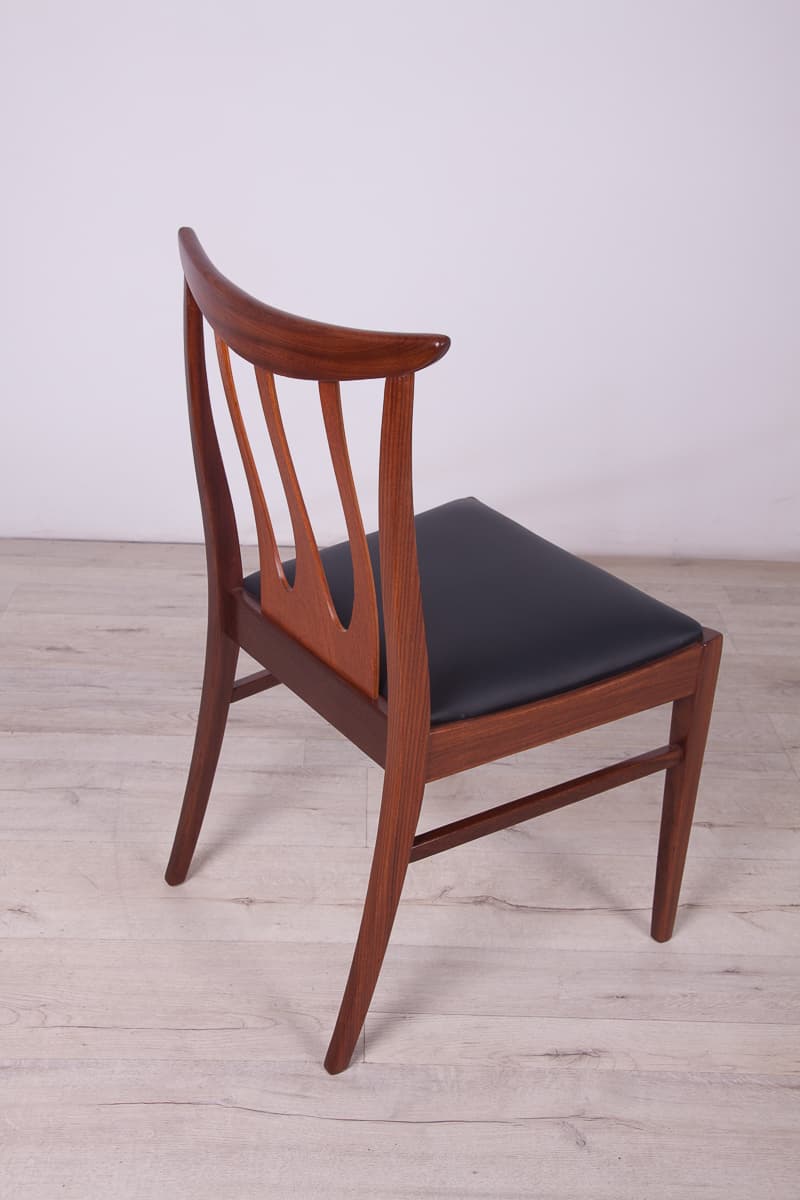 Set of four chairs Brasilia, brown teak, black leather, G-Plan, United Kingdom, 1950s. - 261518
