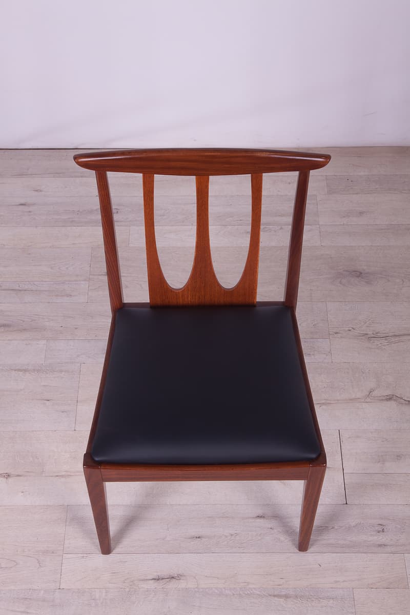 Set of four chairs Brasilia, brown teak, black leather, G-Plan, United Kingdom, 1950s. - 261516