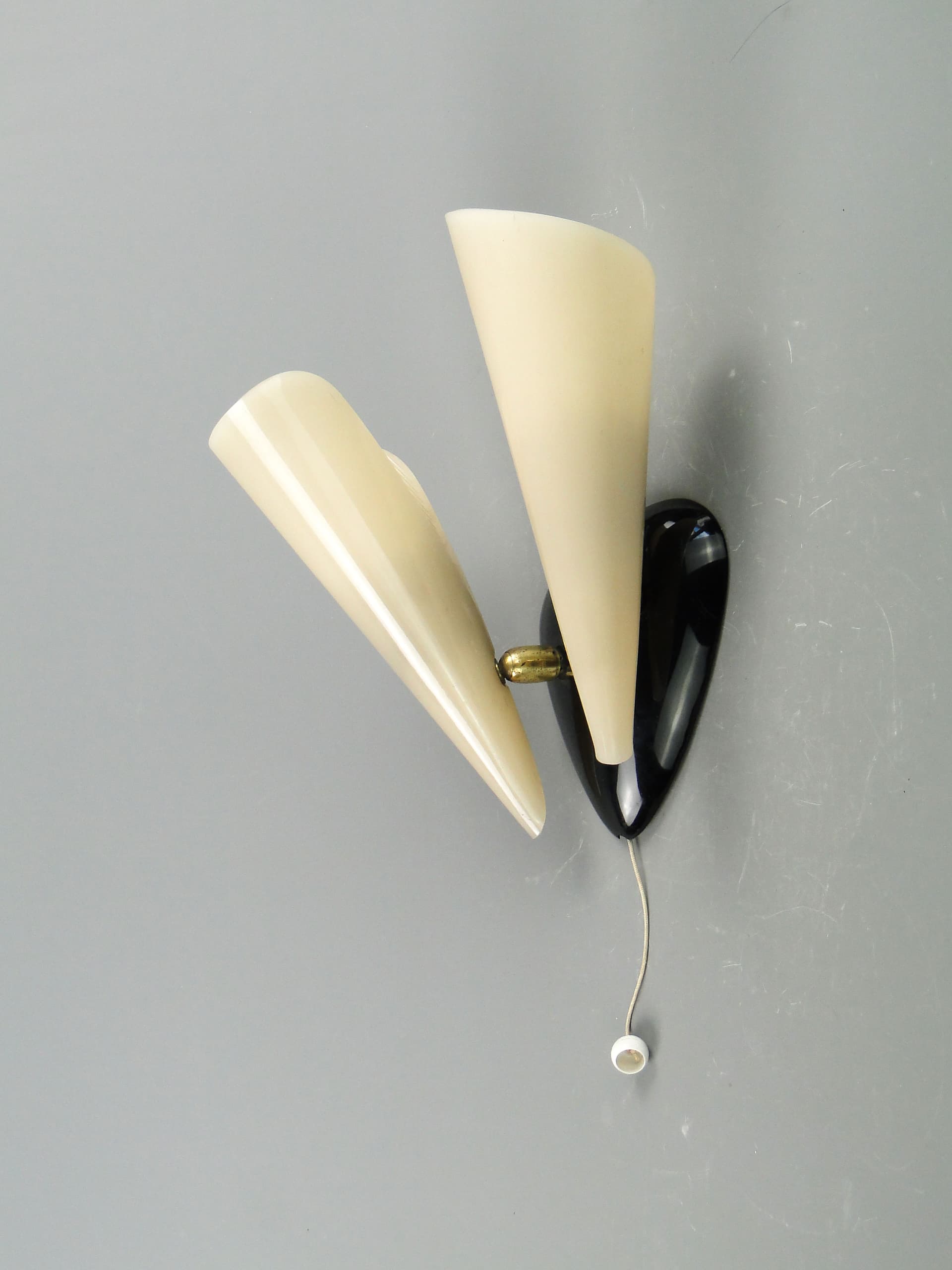 Two-arm wall sconce, ivory black metal, Stilnovo, Italy, 1950s. - 2012
