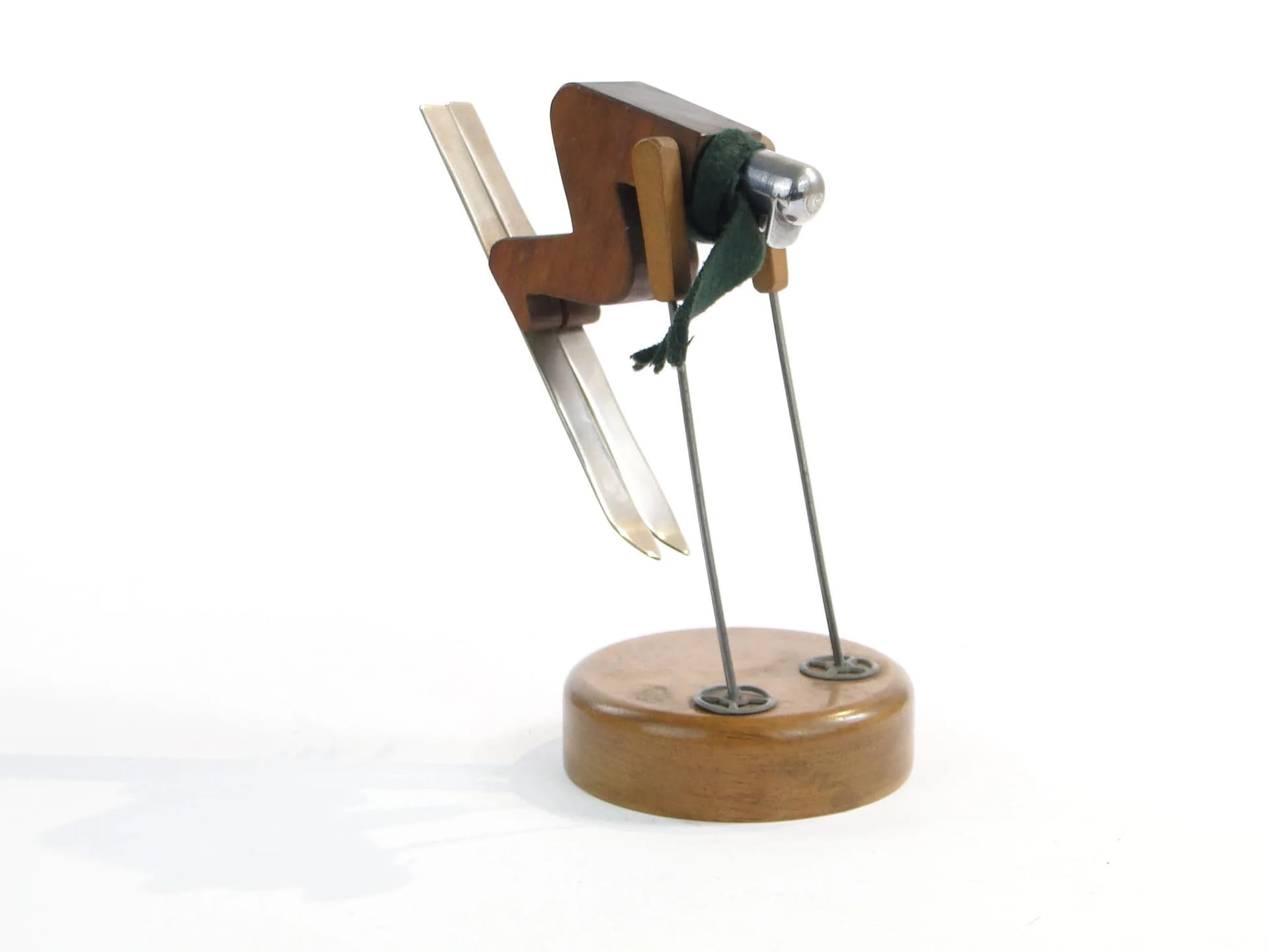 Kinetic skier figurine, brown wood, polished steel, green wool, Austria, 1960s - 19594
