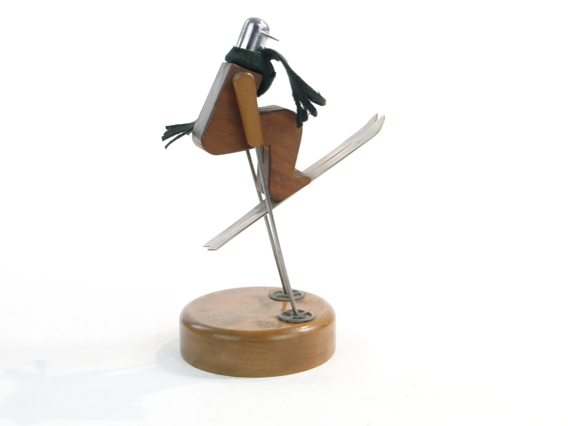 Kinetic skier figurine, brown wood, polished steel, green wool, Austria, 1960s - 19593