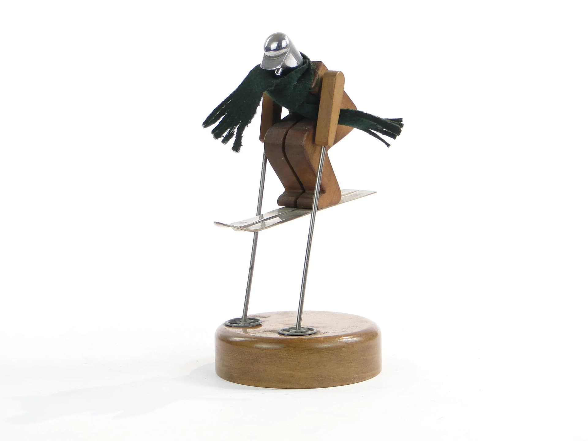 Kinetic skier figurine, brown wood, polished steel, green wool, Austria, 1960s - 19590