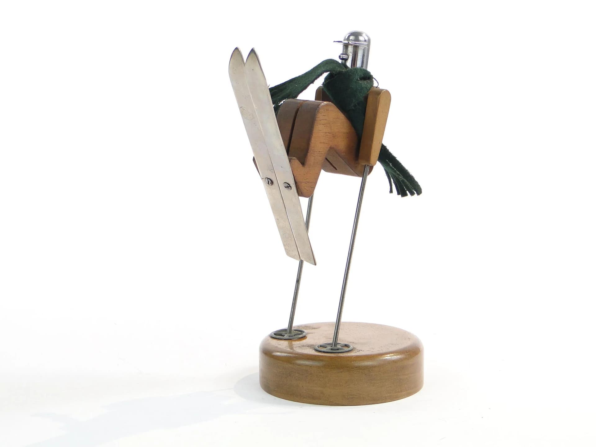Kinetic skier figurine, brown wood, polished steel, green wool, Austria, 1960s - 19596