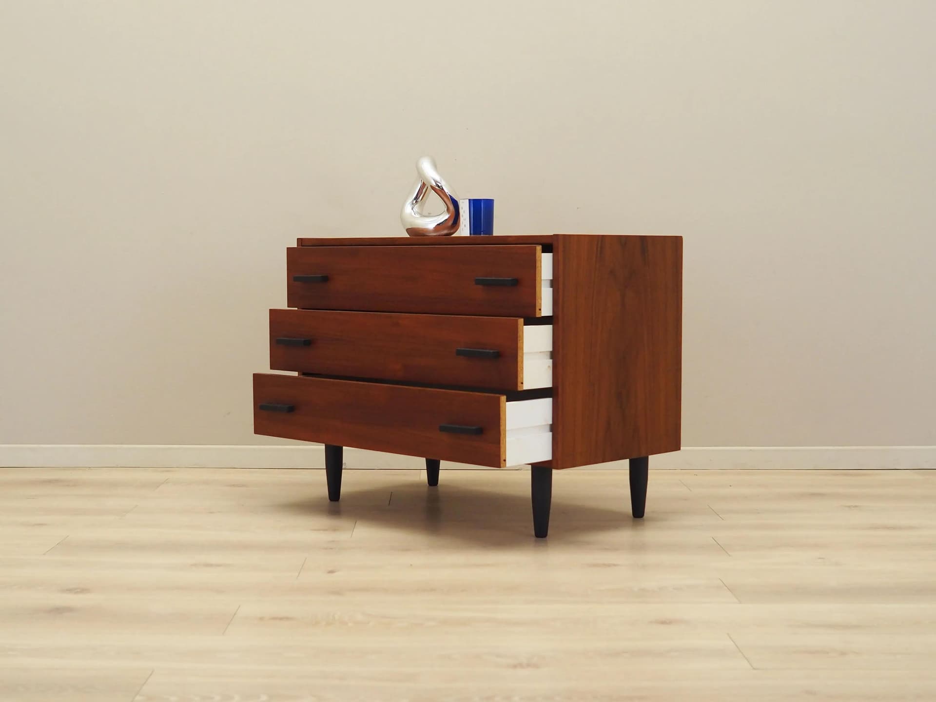 Chest of drawers, orange teak, black wooden legs, Denmark, 1980s. - 20004