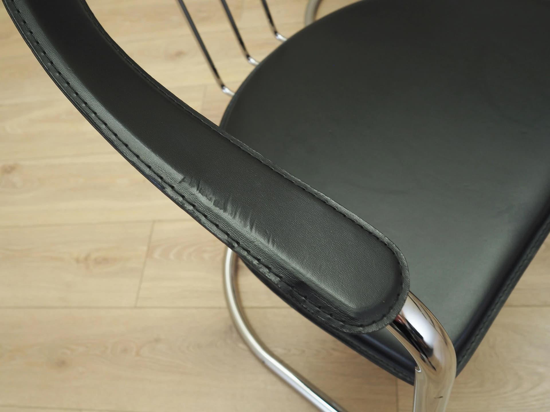 Set of four chairs, black leather, chromed metal, Italy, 1980s. - 22662