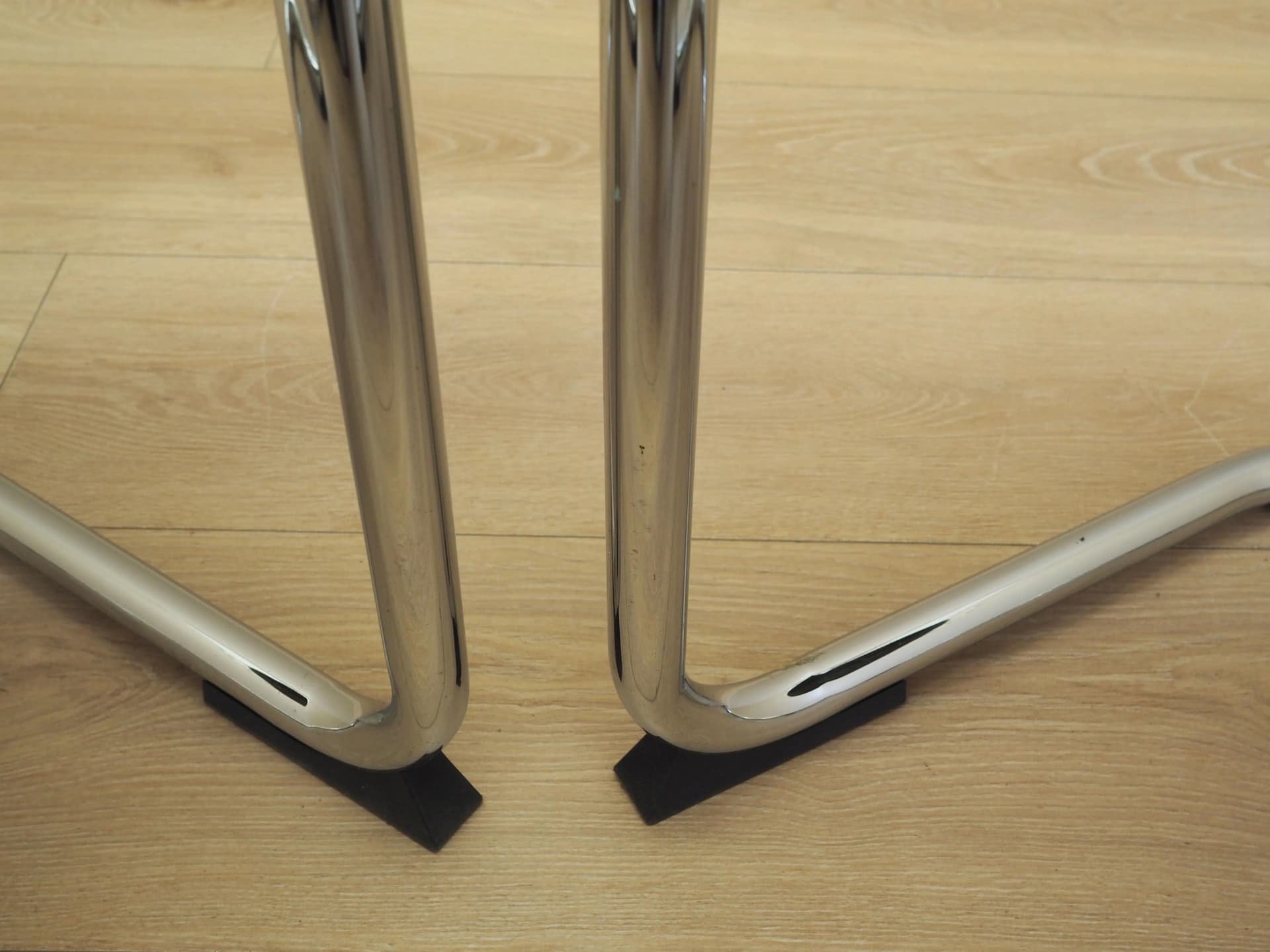 Set of four chairs, black leather, chromed metal, Italy, 1980s. - 22666