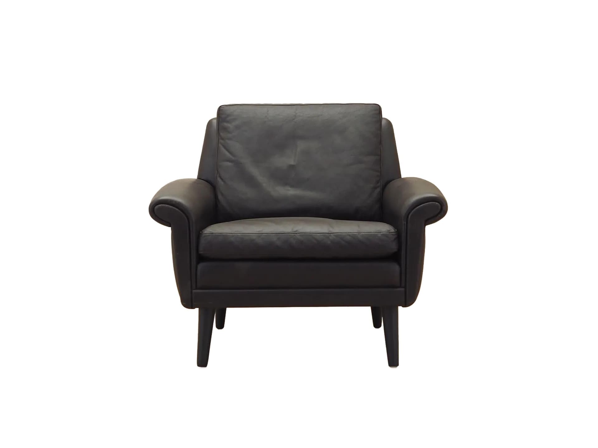 Armchair, brown leather, by A. Christiansen, Denmark, 1960s.