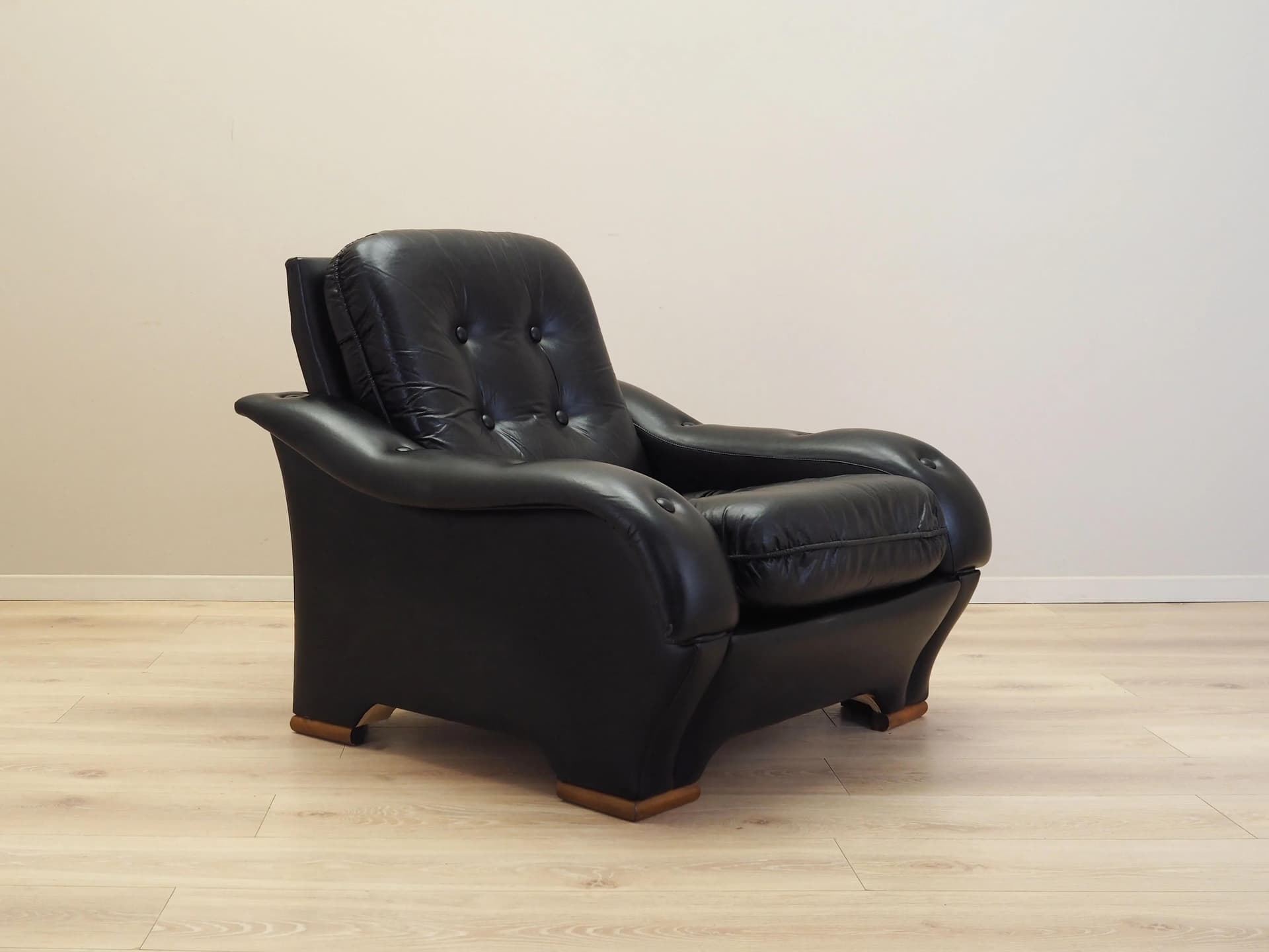 Armchair, postmodernist, black artificial leather, Italy, 1980s. - 23683