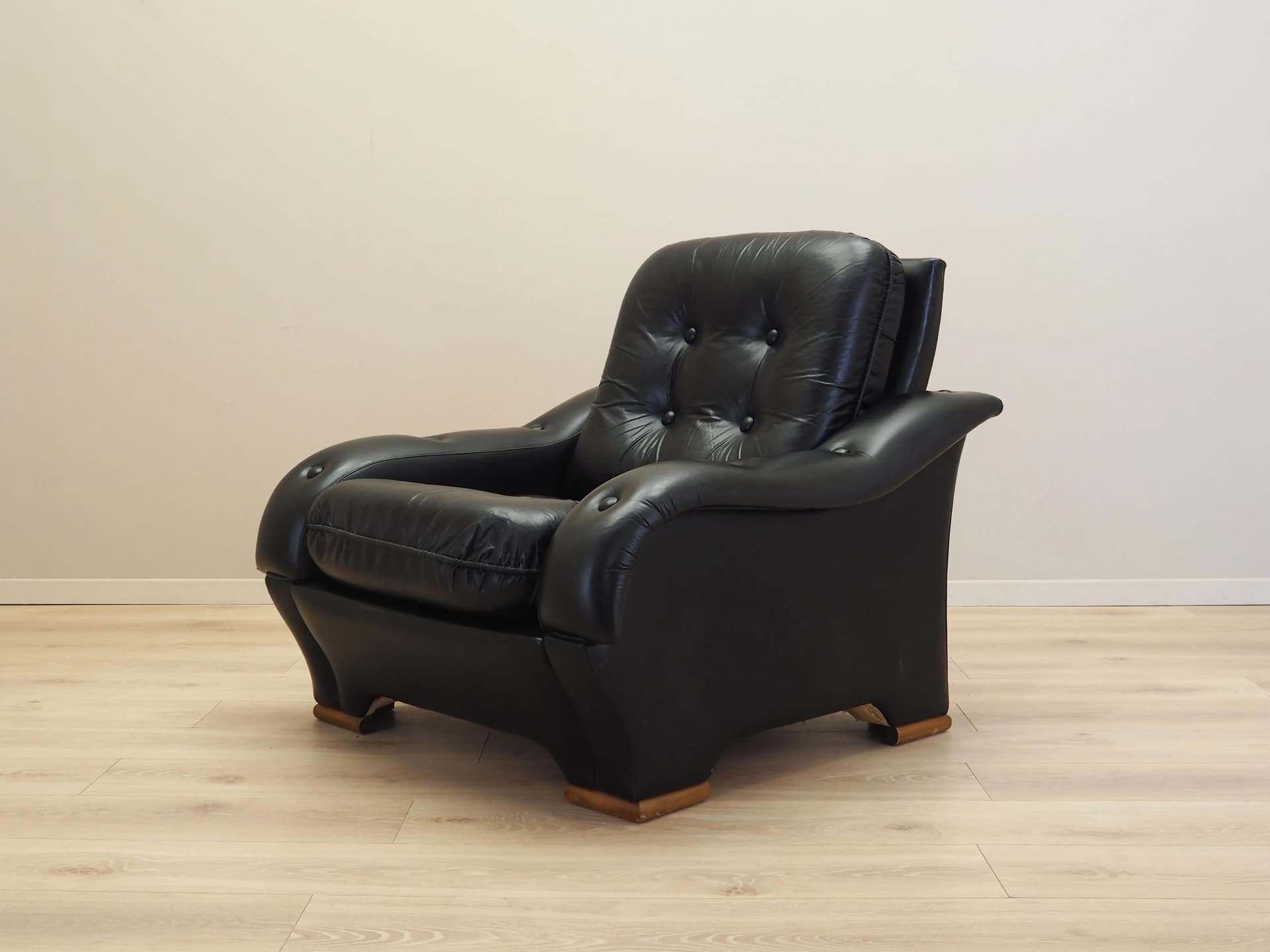 Armchair, postmodernist, black artificial leather, Italy, 1980s. - 23679