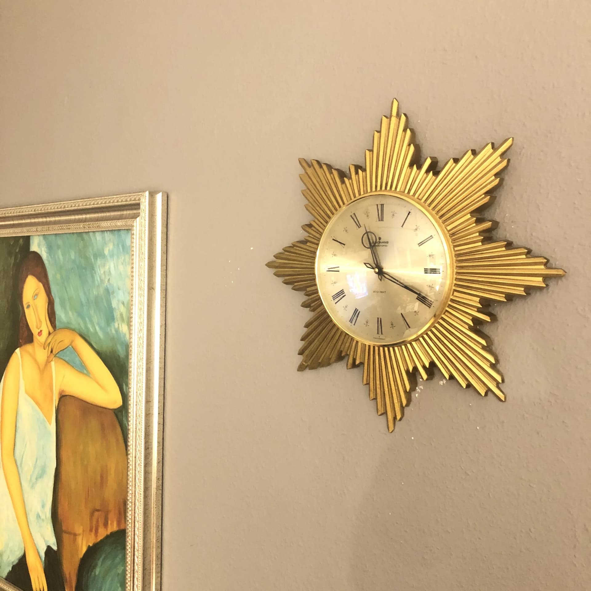 Zegar ścienny starburst, złoty, tworzywo, Junghans, Niemcy, lata 70. - 23941