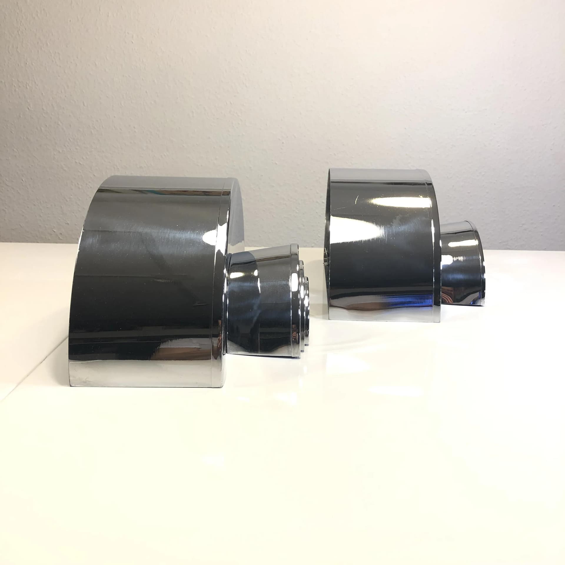 Pair of Art Deco wall sconces, silver chrome-plated brass, Germany, 1960s. - 29986