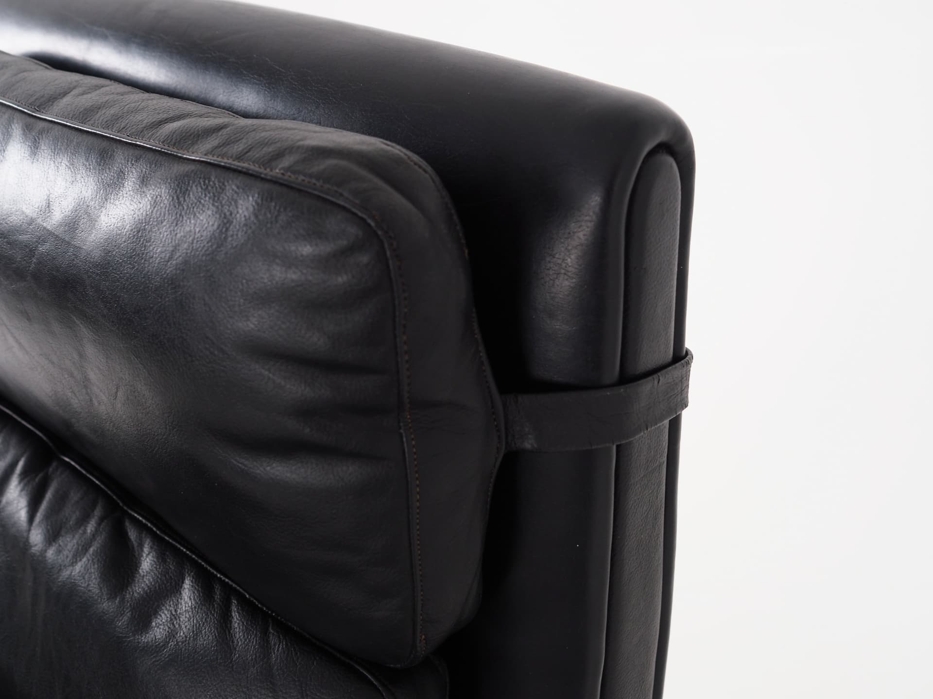 Armchair, black leather, brown rosewood, Denmark, 1970s. - 64652