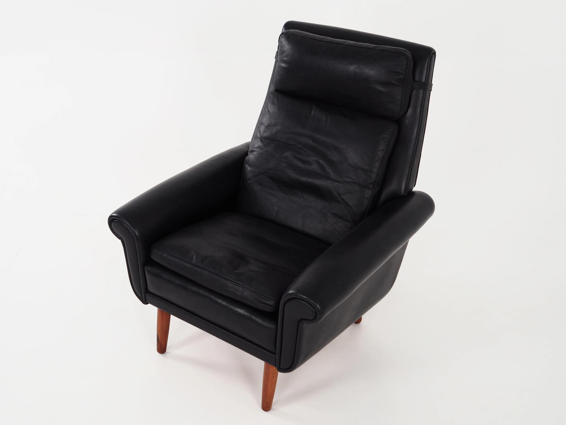 Armchair, black leather, brown rosewood, Denmark, 1970s. - 29812