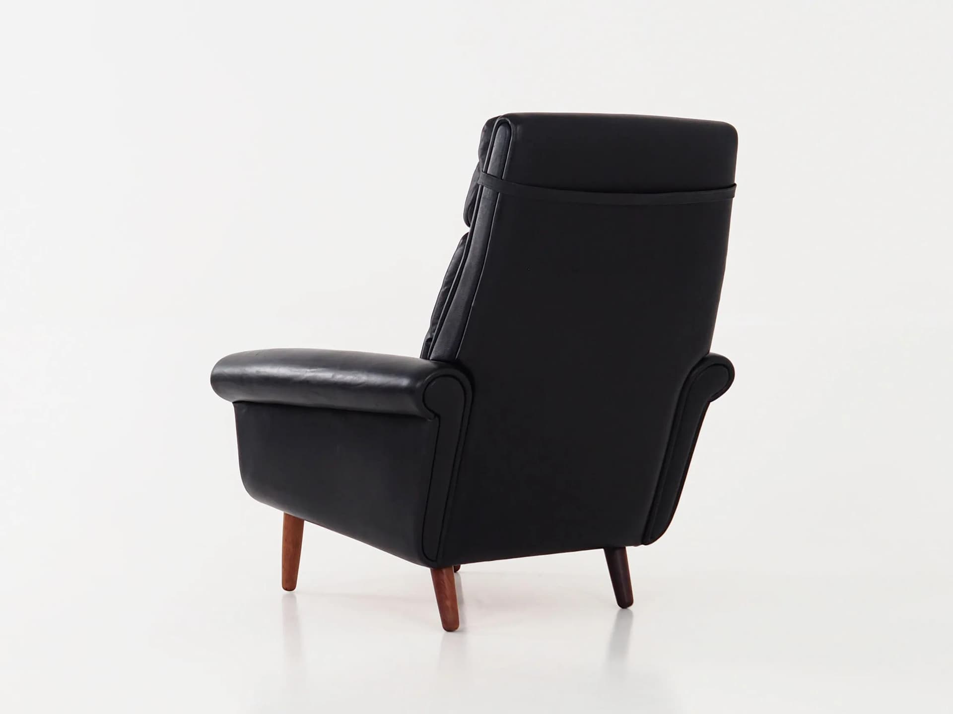 Armchair, black leather, brown rosewood, Denmark, 1970s. - 29810