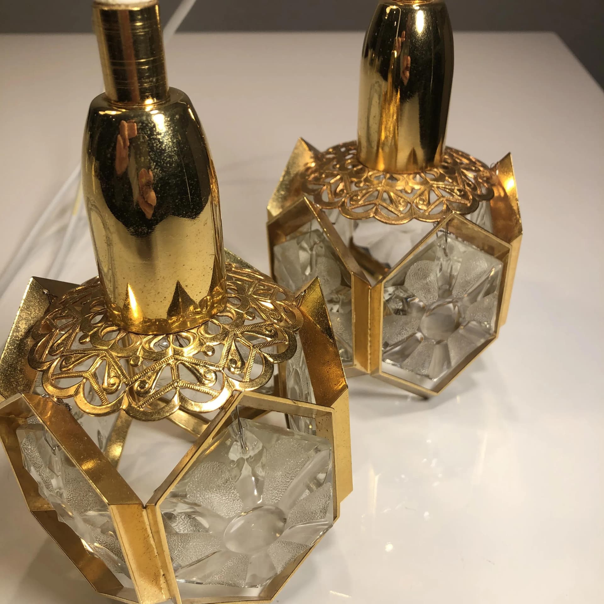 Pair of pendant lamps, gilded brass, crystal, Sweden, 1970s. - 30599