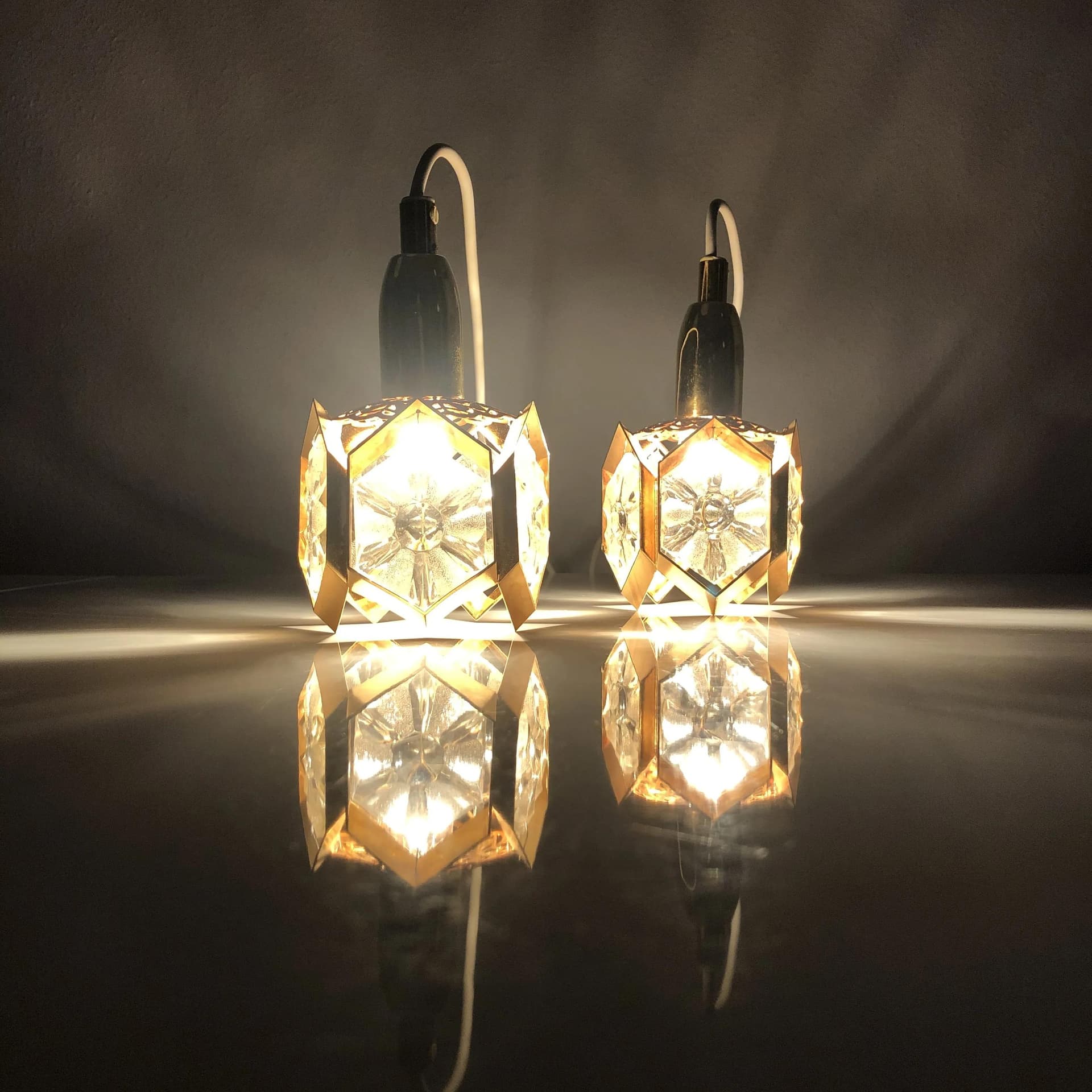 Pair of pendant lamps, gilded brass, crystal, Sweden, 1970s. - 30597