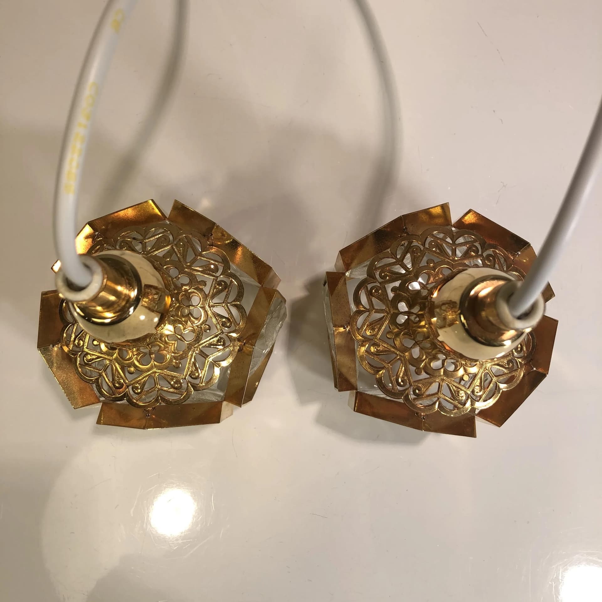 Pair of pendant lamps, gilded brass, crystal, Sweden, 1970s. - 30598