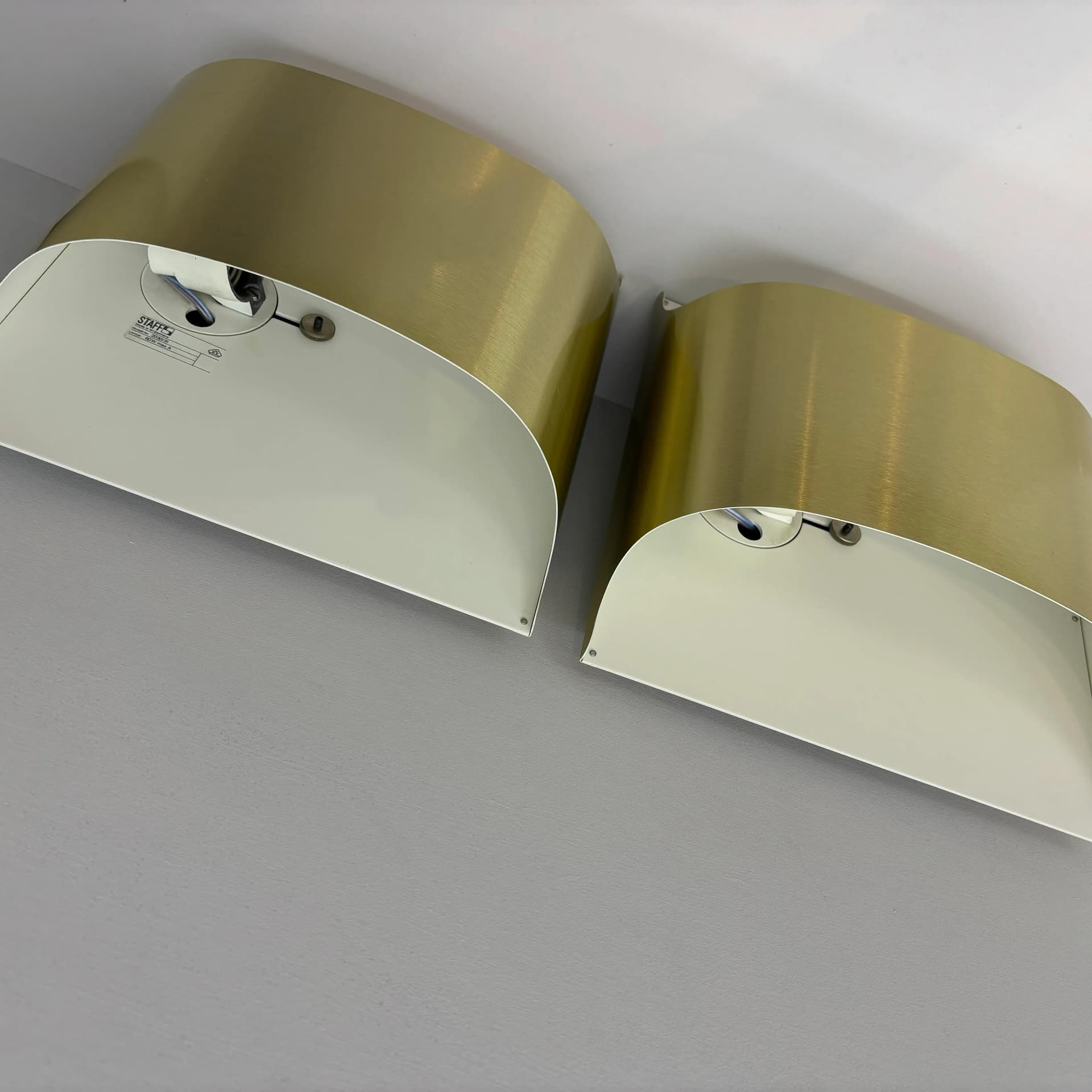 Pair of wall sconces, golden aluminum, by R. Krüger, D. Witte, Staff Leuchten, Germany, 1970s. - 30939