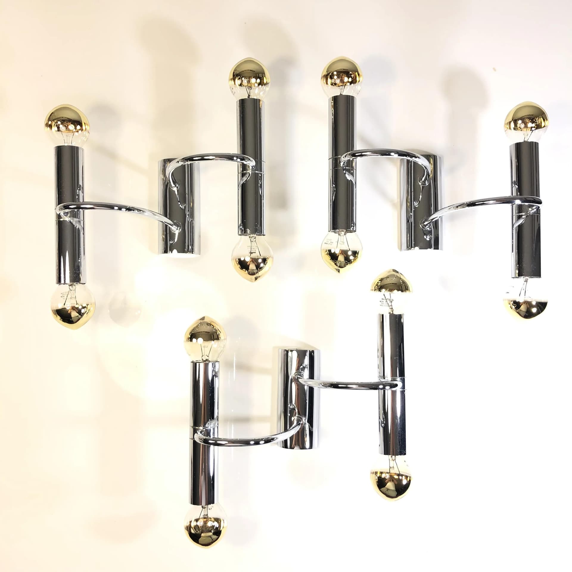 Set of Three Wall Sconces, Space Age, silver chrome-plated brass, Cosack Leuchten, Germany, 1960s. - 31158